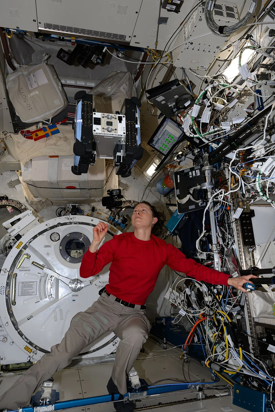 NASA astronaut Tracy Dyson monitoring Astrobee for a student robotics experiment